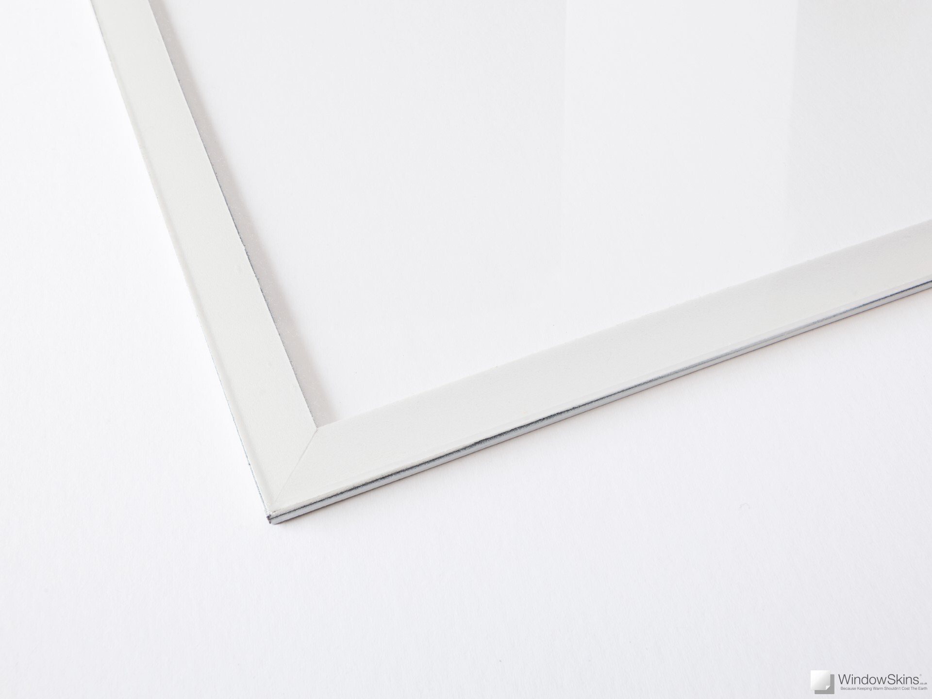 Closeup of a WindowSkins magnetic secondary glazing panel set against a white background