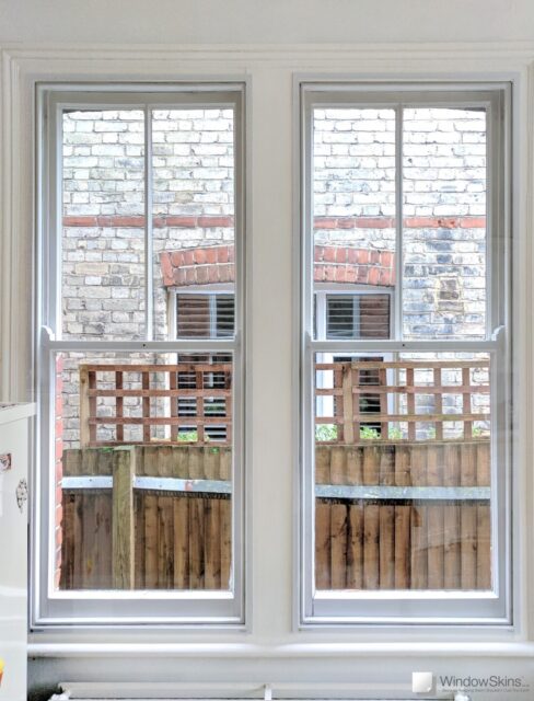 Pair of sash windows with WindowSkins magnetic secondary glazing installed