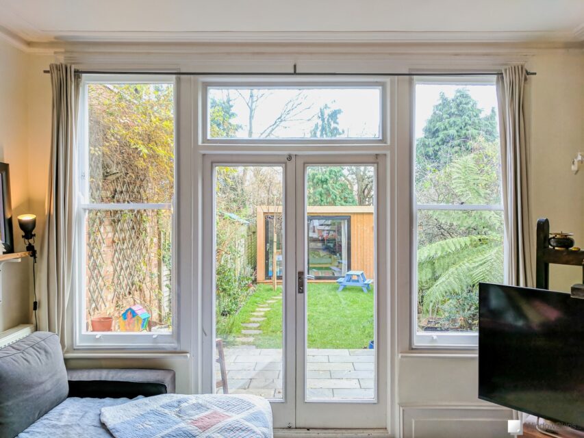 WindowSkins secondary glazing installation on a pair of French doors with adjoining Sash Windows
