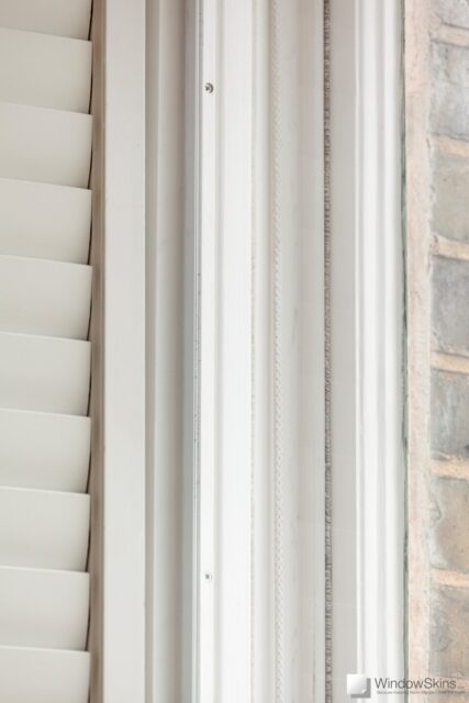 Closeup of a bespoke timber subframe and WindowSkins secondary glazing fitted to shuttered sash windows