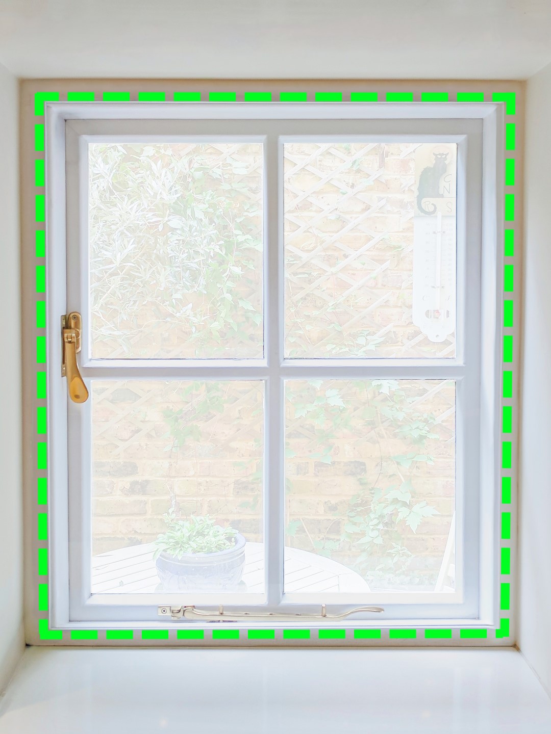 Casement window with dashed green line illustrating outer placement positioning