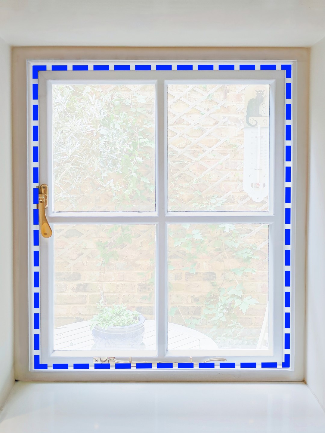 Casement window with dashed blue line illustrating subframe placement positioning