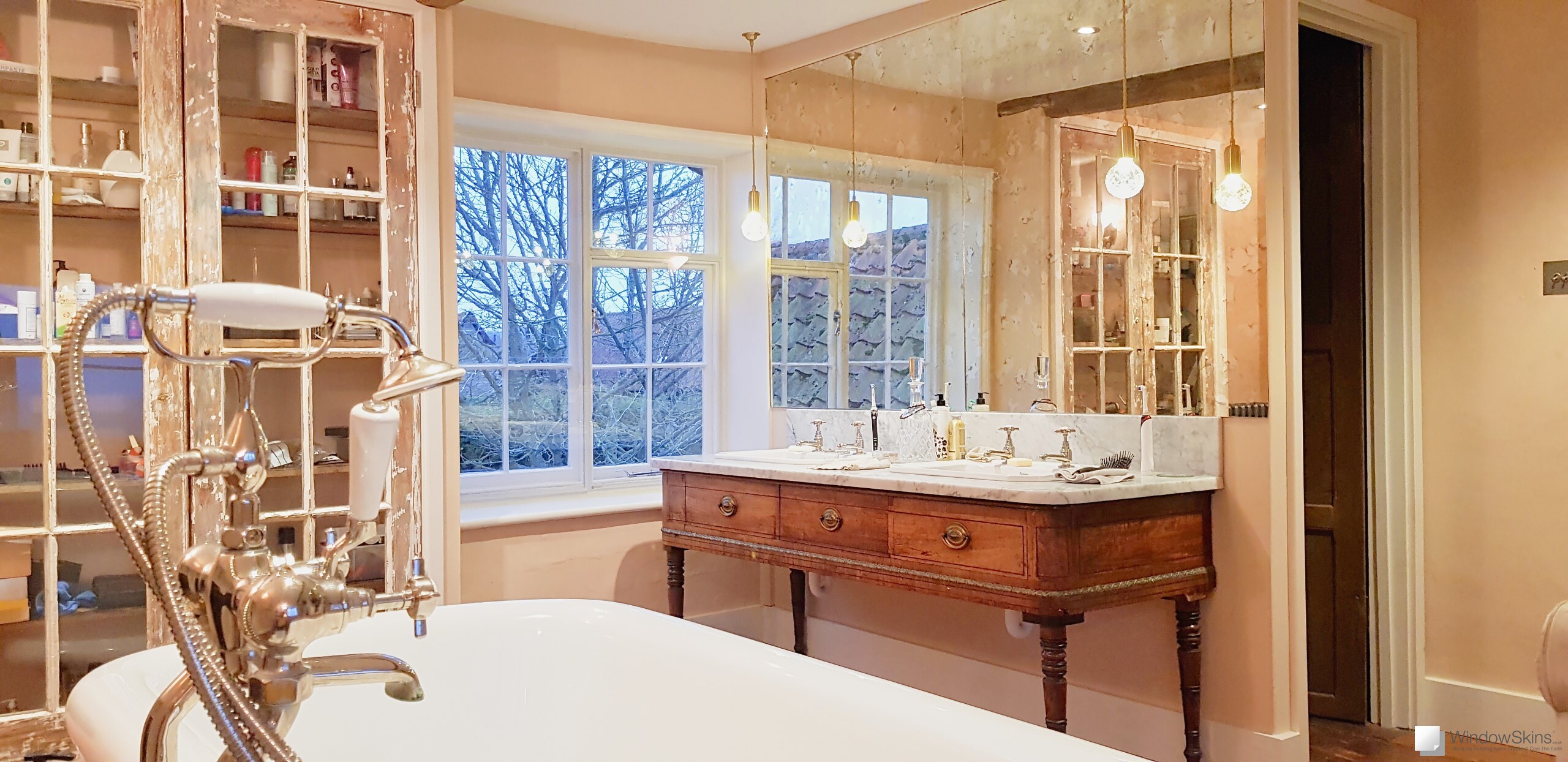 Timber casement window in a beautifully appointed bathroom fitted with elegant WindowSkins magnetic secondary glazing