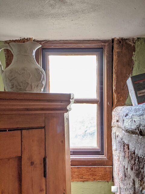 Small cottage window fit with dark brown magnetic secondary glazing