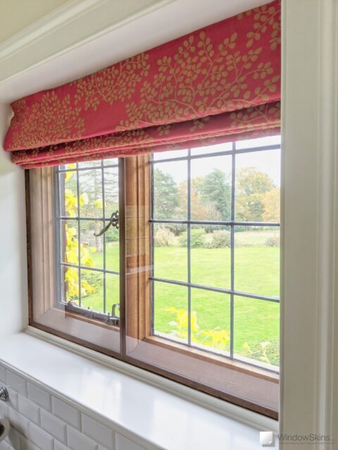 Two Grade II Listed timber casement and steel windows with wood grain colour matched magnetic secondary glazing