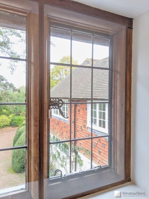 PXL_20201101_130526106 (QHD) Grade II Listed timber casement and steel window with wood grain colour matched magnetic secondary glazing