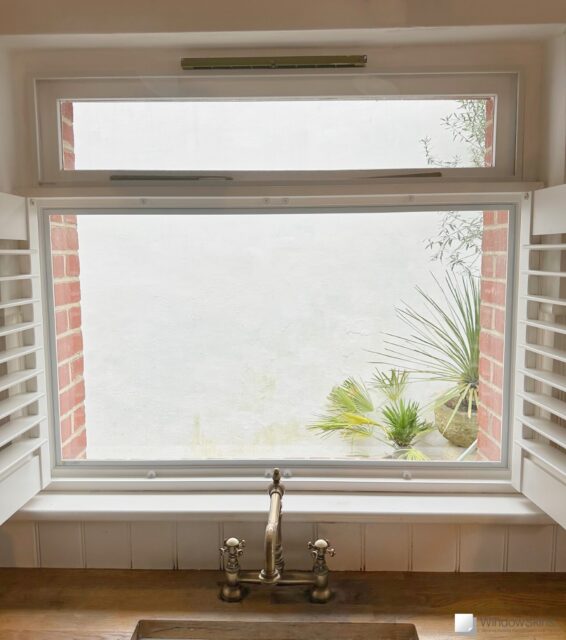 IMG_9406 (QHD) Kitchen casement window with plantation style shutters fitted with WindowSkins magnetic secondary glazing using the subframe placement