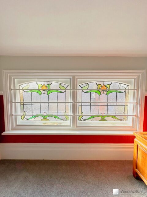 IMG_6377 (QHD) Pair of mezzanine stained glass windows with security bars fitted with WindowSkins magnetic secondary glazing