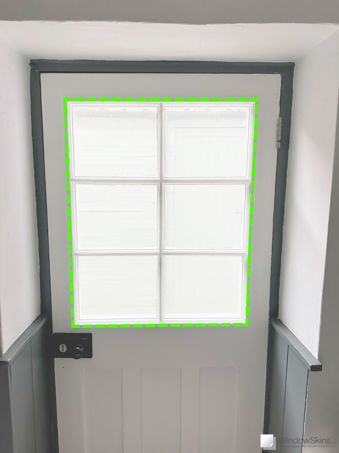 Garden door with green dashed outline illustrating magnetic secondary glazing mounting position