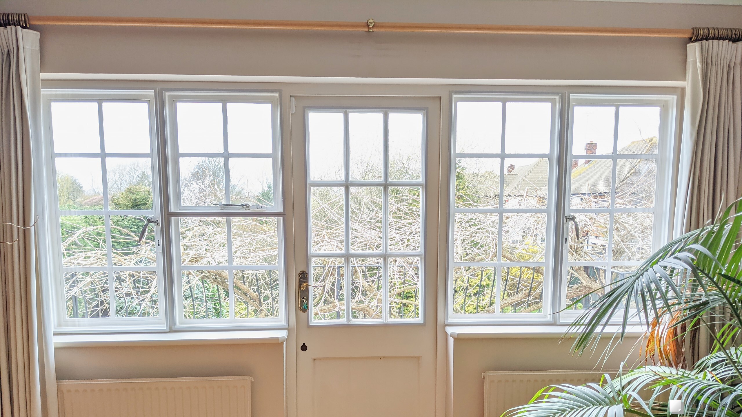 Magnetic secondary glazing fitted on timber framed steel windows and centre balcony door