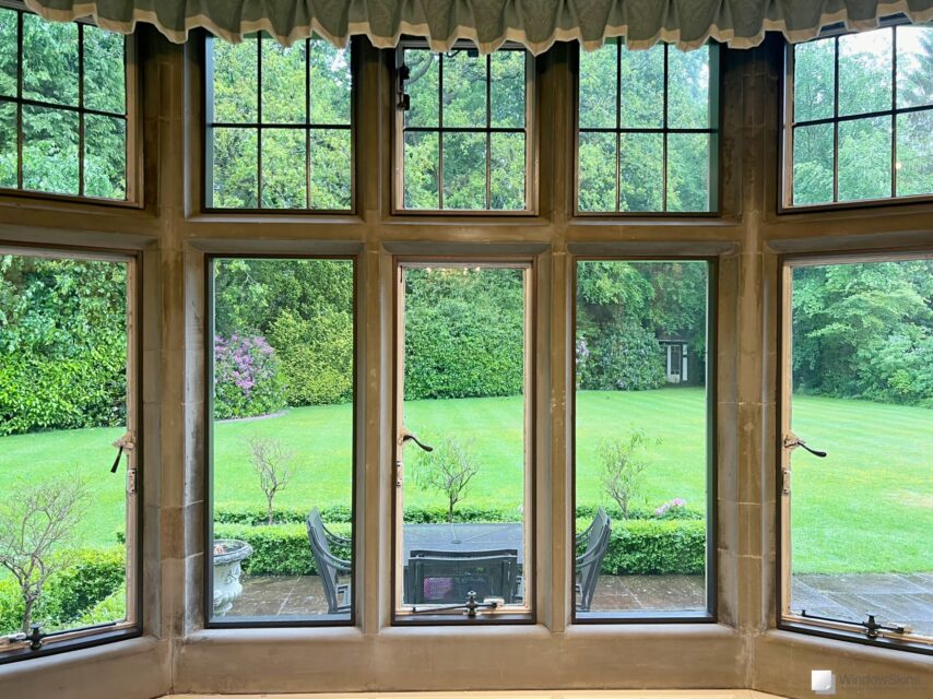 Painted timber frames fitted to a stone mullion window bay in preparation for the fitting of WindowSkins magnetic secondary glazing