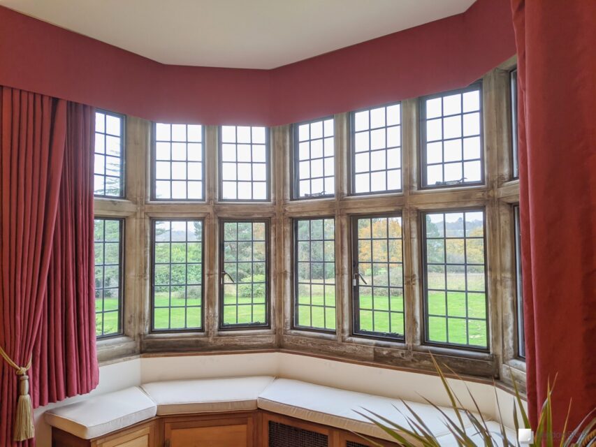 Near invisible secondary glazing installed to a stone mullion window bay in a period listed property