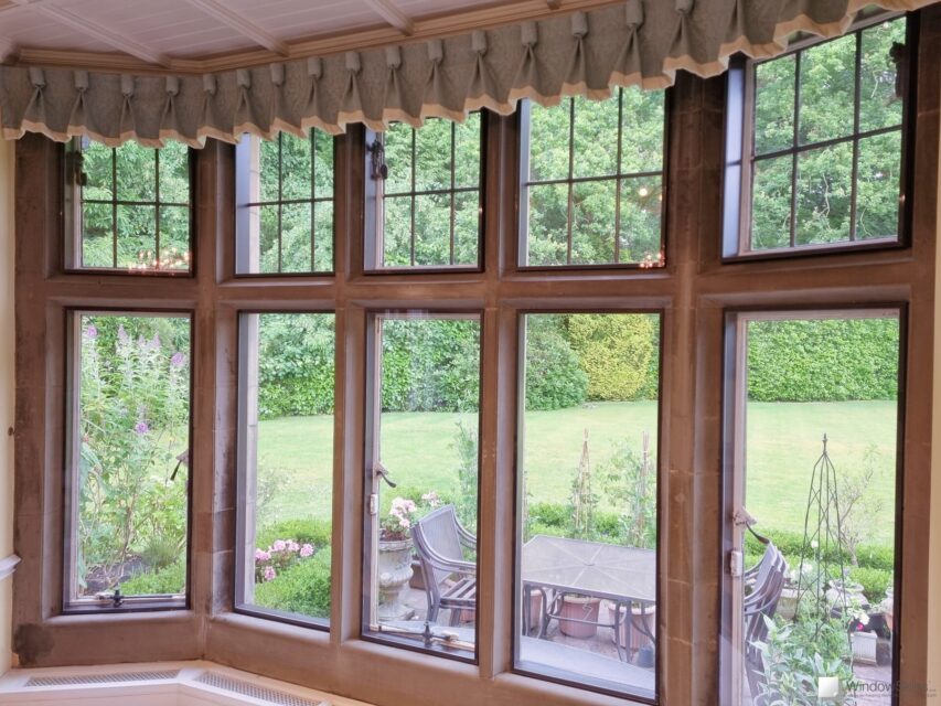 Listed property stone mullion windows fitted with bespoke painted timber frames and WindowSkins magnetic secondary glazing