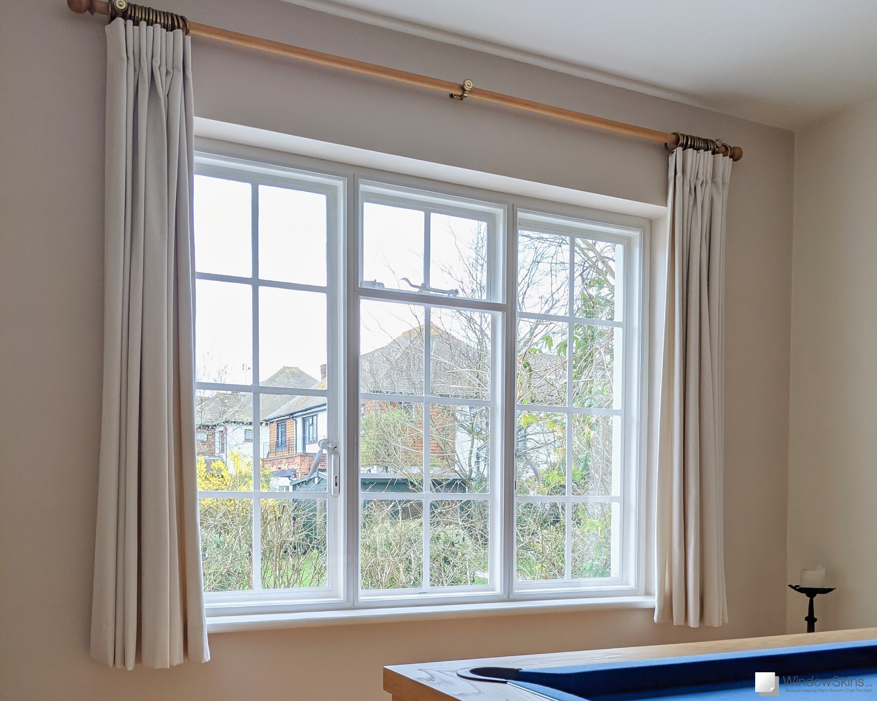Timber sash window with magnetic secondary glazing to reduce draughts, heat loss and cold in a period home