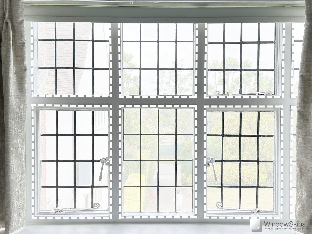 Steel framed leaded casement windows set within timber framework and fitted with magnetic secondary glazing to reduce cold and heat loss