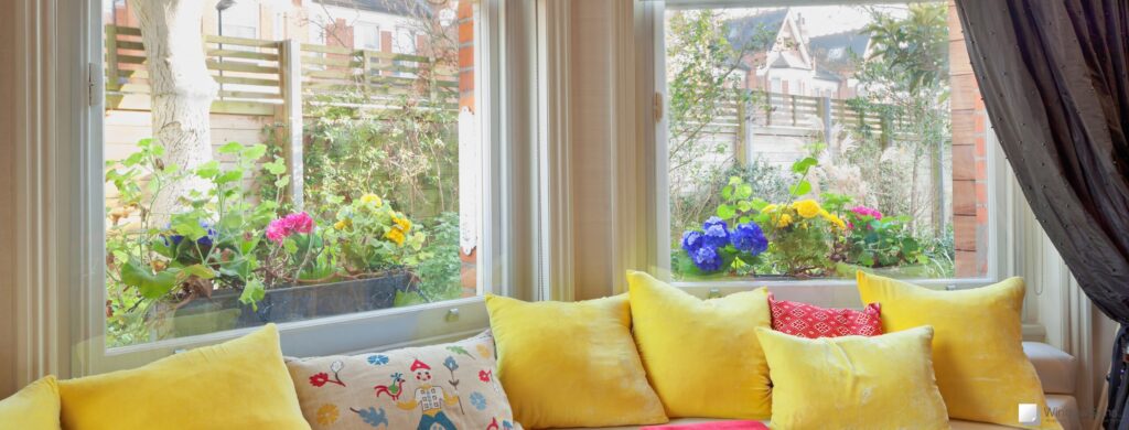 Wide Bay Sash seating with WindowSkins magnetic secondary glazing fitted in the background