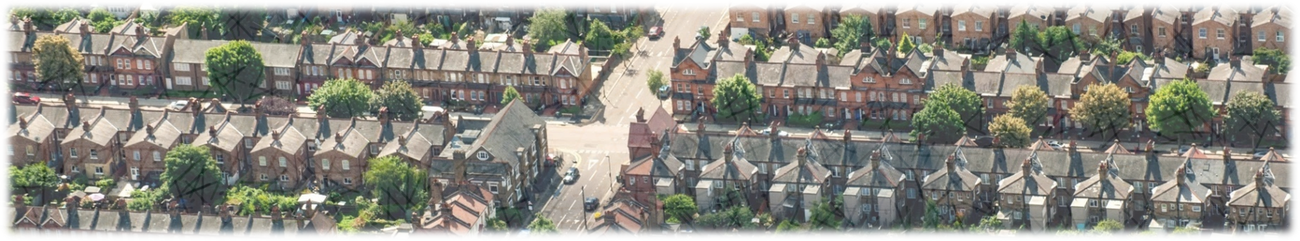 Aerial view of UK period homes and terraced houses suitable for secondary glazing and draught reduction solutions